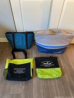 All four bags standing for size and style reference