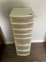 Front view of white plastic six-drawer unit