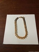 Full view of bracelet laid flat on white background