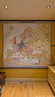 Full view of entire square wall-mounted map showing Europe with country borders and color coding.