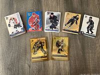 Top view showing various stacks of hockey cards with gold and platinum cards in front
