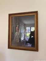 Full view of framed portrait of woman in historical dress, showing entire frame and painting.