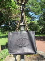 Front view showing CC logo and chain straps