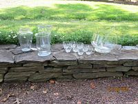 Group shot showing punch bowl with ladle, eight cups, three vases