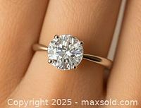 Ring worn on model finger showing overall appearance