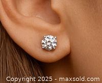 Single stud earring worn in model’s ear to show scale and appearance