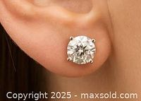 Stud earring worn on ear to show scale and fit.