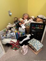 Full lot showing various dolls, plush toys, craft supplies, and wooden toys