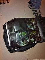 Photo of three DVD discs from TV show Oz labeled disc 07 with images of characters.