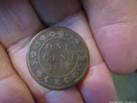 Reverse image showing 'ONE CENT 1859' surrounded by wreath