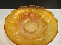 Top view showing detailed dragon and lotus embossed pattern with iridescent finish.