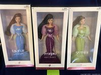 Front view of all three Barbie Zodiac Collector Dolls in original boxes for Taurus, Scorpio, Gemini