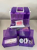 Open view of Wilton cake decorating caddy filled with baking tools