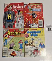 Front covers of four Archie comic books showing different editions and themes.