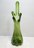 Front view of the green art glass swung vase with five finger design showing lime to dark green color gradient and wavy base