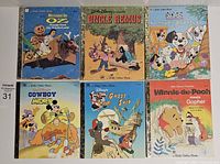 Front covers of six Little Golden Books showing colorful children’s story illustrations including Disney characters and Uncle Remus.
