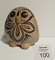 Front angle of the Tonala owl figurine showing the hand-painted owl face and painted feather details, standing on two small feet.