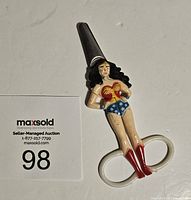 Front view of Vintage Wonder Woman Children's scissors showing full figure and handle finger holes with blades closed.