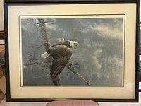 Full view of framed lithograph showing image, mat, and frame