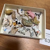 Box containing all miniature animal figurines