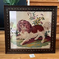 Front view showing full needlepoint and frame
