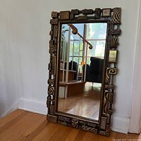 Front view showing mirror, frame design and proportions