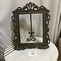 Front view of entire ornate frame