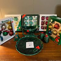 Group shot showing all ceramic pieces and four boxes of ornaments