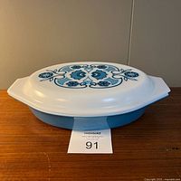 Side view of lidded casserole showing Horizon Blue pattern