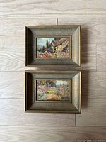 Two vintage framed floral prints, both about 8 x 6 inches, showing colorful garden scenes.