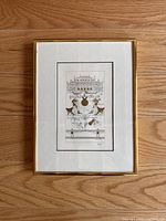 Full view of framed print showing detailed musical and architectural imagery.