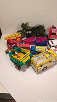 Group of mixed toy vehicles