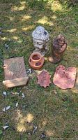 Group shot of all six garden decor items on grass