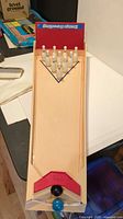 Full view of Snap Bowling board with pins set up
