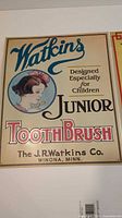 Watkins Junior Tooth Brush sign full view