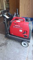 Generator on wheeled cart, front-left perspective