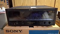 Front view of amplifier showing Sony logo and dual meter display