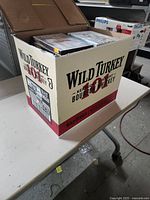 Wild Turkey Whiskey cardboard box used to hold DVDs.