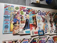 Photo showing multiple Cracked magazines from 1988-1989 with colorful illustrated covers and varying degrees of wear.