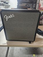 Front view of Fender amplifier showing Fender logo and silver grille cloth.