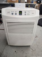 Front view of Kenmore dehumidifier showing digital control panel, display, and front air vents.