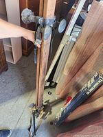 Photo showing full length of the wooden roof rack with metal clamps and rubber feet