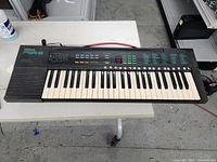 Full view of Yamaha PSR-6 keyboard showing keys and control panel layout.