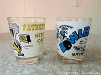Front view of both novelty glasses showing graphics