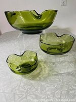 All three avocado green bowls grouped