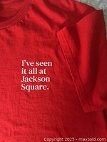 Front chest view showing slogan