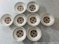 Top view showing all eight bowls and pattern