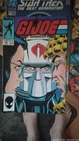 Cover of G.I. Joe comic book showing characters including Cobra Commander and other figures, Marvel Comics logo visible.