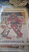 Magnet of Florida Panthers goalie John Vanbiesbrouck in full gear, action pose, measuring 7.5x6.5 inches