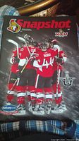 Front cover of Snapshot hockey magazine showing Ottawa Senators players celebrating during the 2005 Stanley Cup Playoffs.